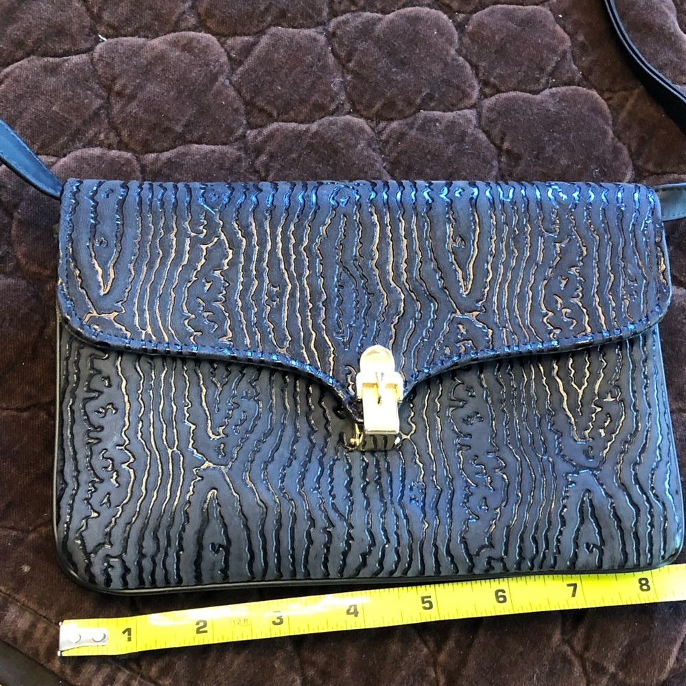Robert Bestien carverd leather vintage clutch